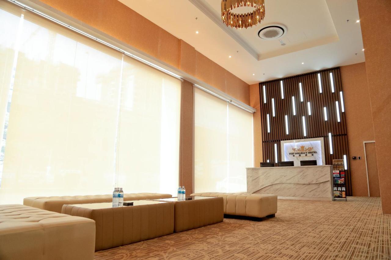 Top Holiday Hotel เซอรีเคมบางัน ภายนอก รูปภาพ